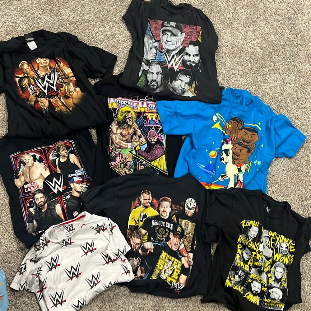 Collection of WWE youth shirts